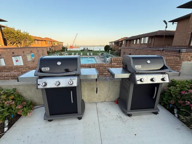 a view of a terrace with a barbeque