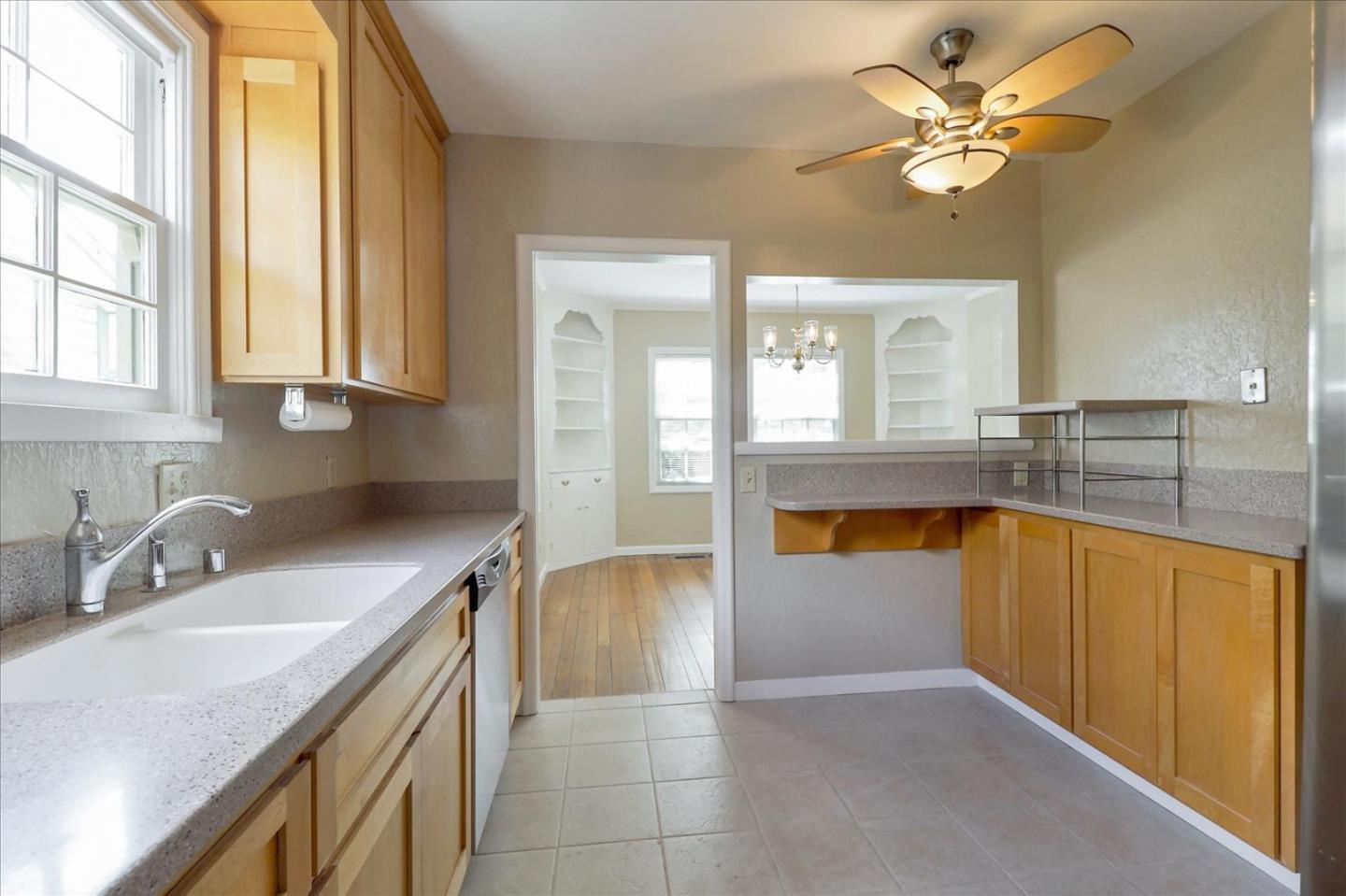 420 Sunset Boulevard Hayward, CA 94541 - Photo 11 of 51 a kitchen with a sink a counter top space and appliances