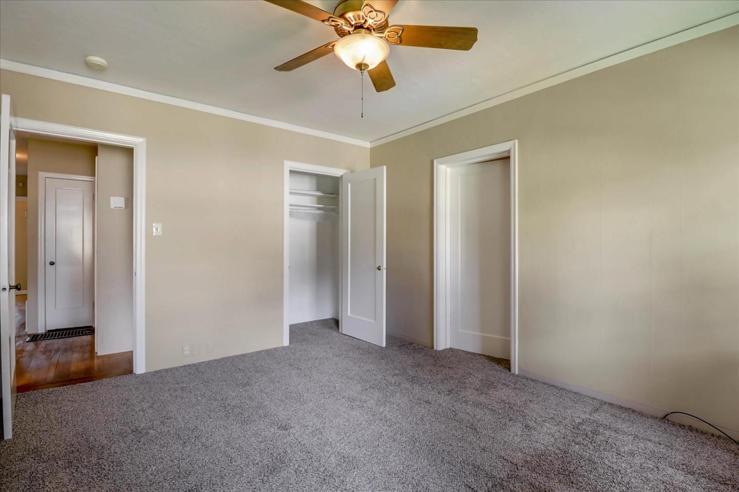 420 Sunset Boulevard Hayward, CA 94541 - Photo 24 of 51 an empty room with closet and a chandelier fan