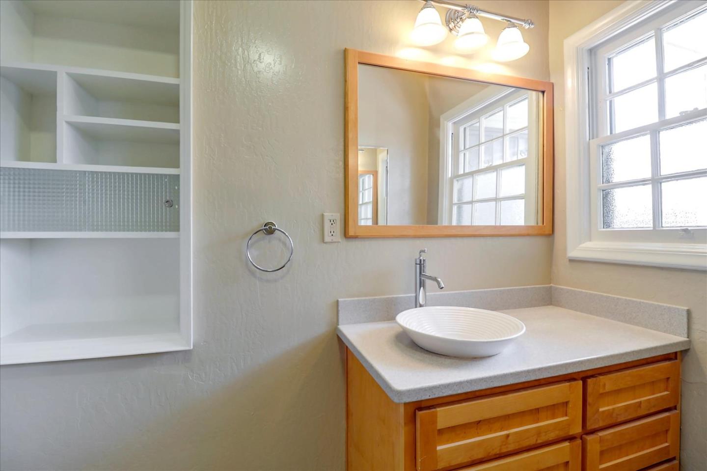 420 Sunset Boulevard Hayward, CA 94541 - Photo 29 of 51 a sink with a mirror