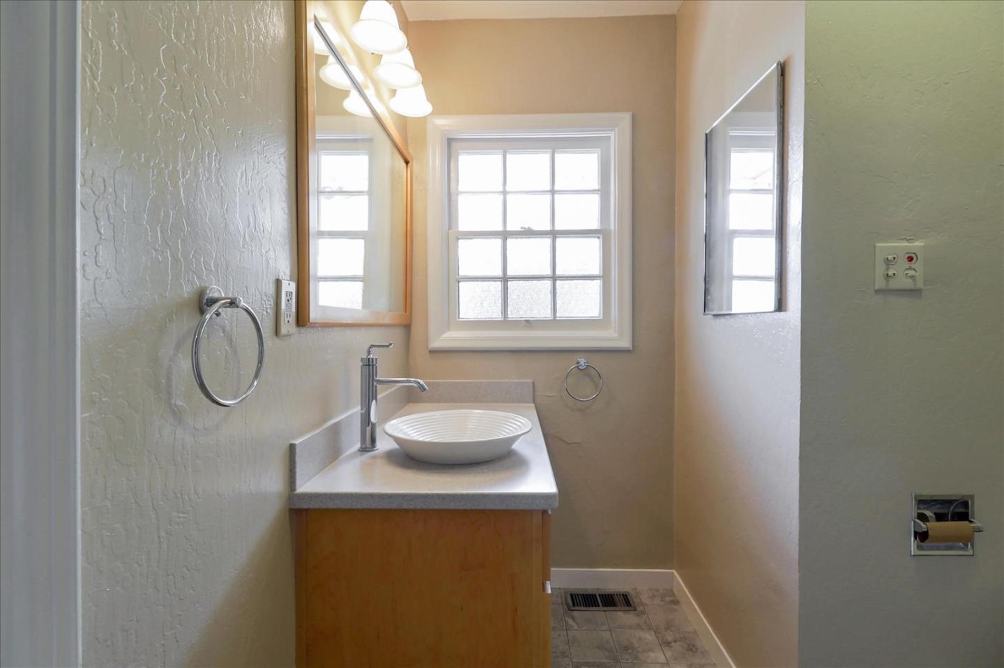 420 Sunset Boulevard Hayward, CA 94541 - Photo 30 of 51 a bathroom with a sink and a vanity