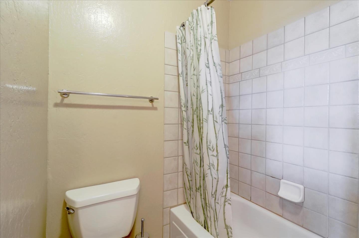 420 Sunset Boulevard Hayward, CA 94541 - Photo 31 of 51 a bathroom with a shower and a toilet
