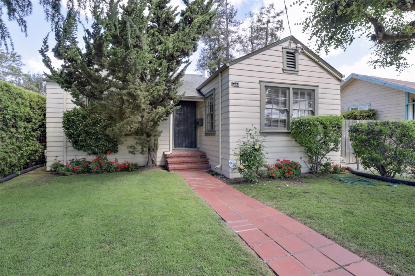 420 Sunset Boulevard Hayward, CA 94541 - Photo 4 of 51 a front view of a house with a garden