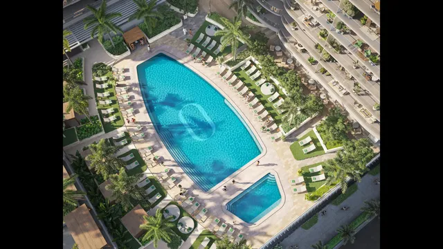 a view of a lake with lawn chairs