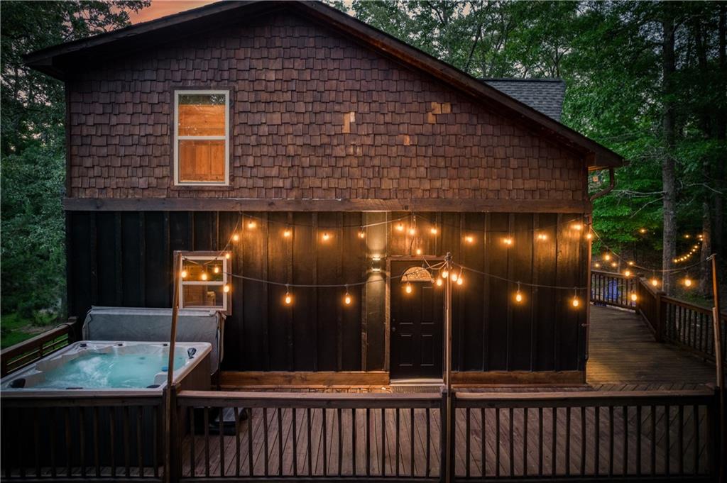 774 Kelly Ridge Drive Blue Ridge, GA 30513 - Photo 16 of 99 a view of a brick house with outdoor seating