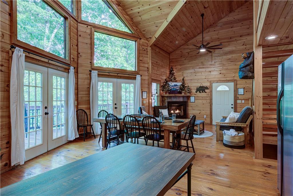 774 Kelly Ridge Drive Blue Ridge, GA 30513 - Photo 29 of 99 a view of a dining room with furniture window and wooden floor