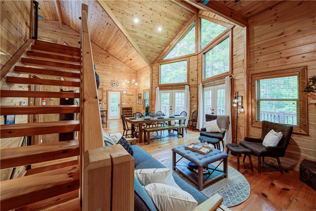 774 Kelly Ridge Drive Blue Ridge, GA 30513 - Photo 43 of 99 a living room with furniture and a large window