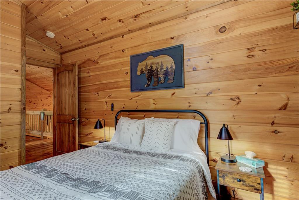 774 Kelly Ridge Drive Blue Ridge, GA 30513 - Photo 50 of 99 a bedroom with a bed and a dresser