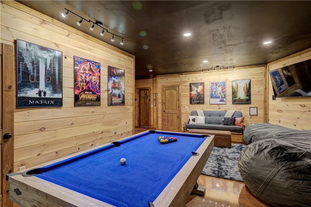 774 Kelly Ridge Drive Blue Ridge, GA 30513 - Photo 51 of 99 a living room with stainless steel appliances kitchen island granite countertop furniture and flat screen tv