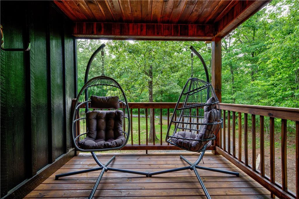 774 Kelly Ridge Drive Blue Ridge, GA 30513 - Photo 63 of 99 a view of a two chairs in the balcony