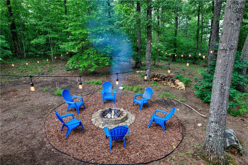 774 Kelly Ridge Drive Blue Ridge, GA 30513 - Photo 66 of 99 a view of a table and chairs in the patio