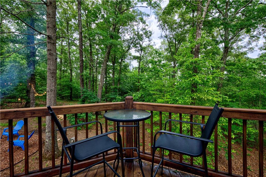 774 Kelly Ridge Drive Blue Ridge, GA 30513 - Photo 67 of 99 a view of a chair and table in the balcony