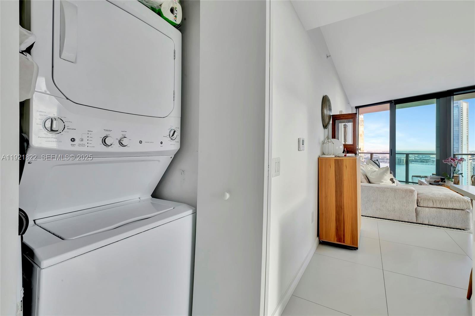 501 Northeast 31st Street, Unit 3708 Miami, FL 33137 - Photo 15 of 31 a utility room with dryer and washer