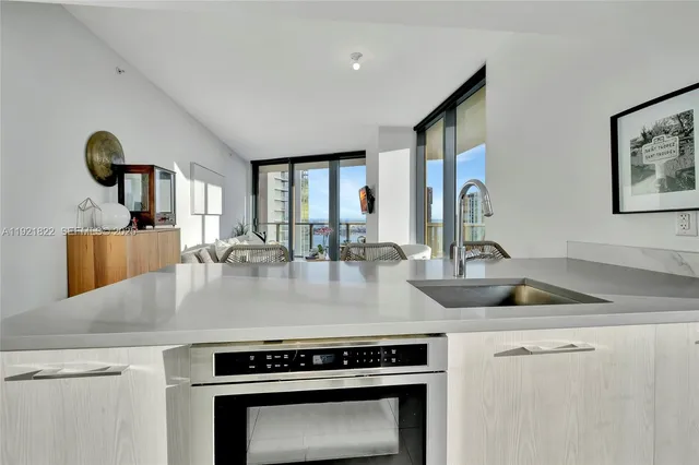 a kitchen with a stove and a sink