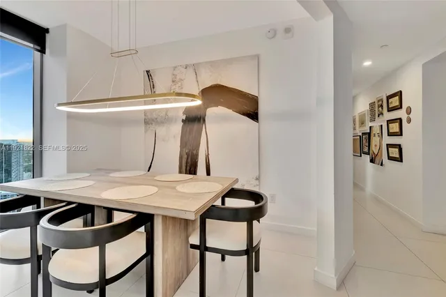 a table and chairs in a kitchen