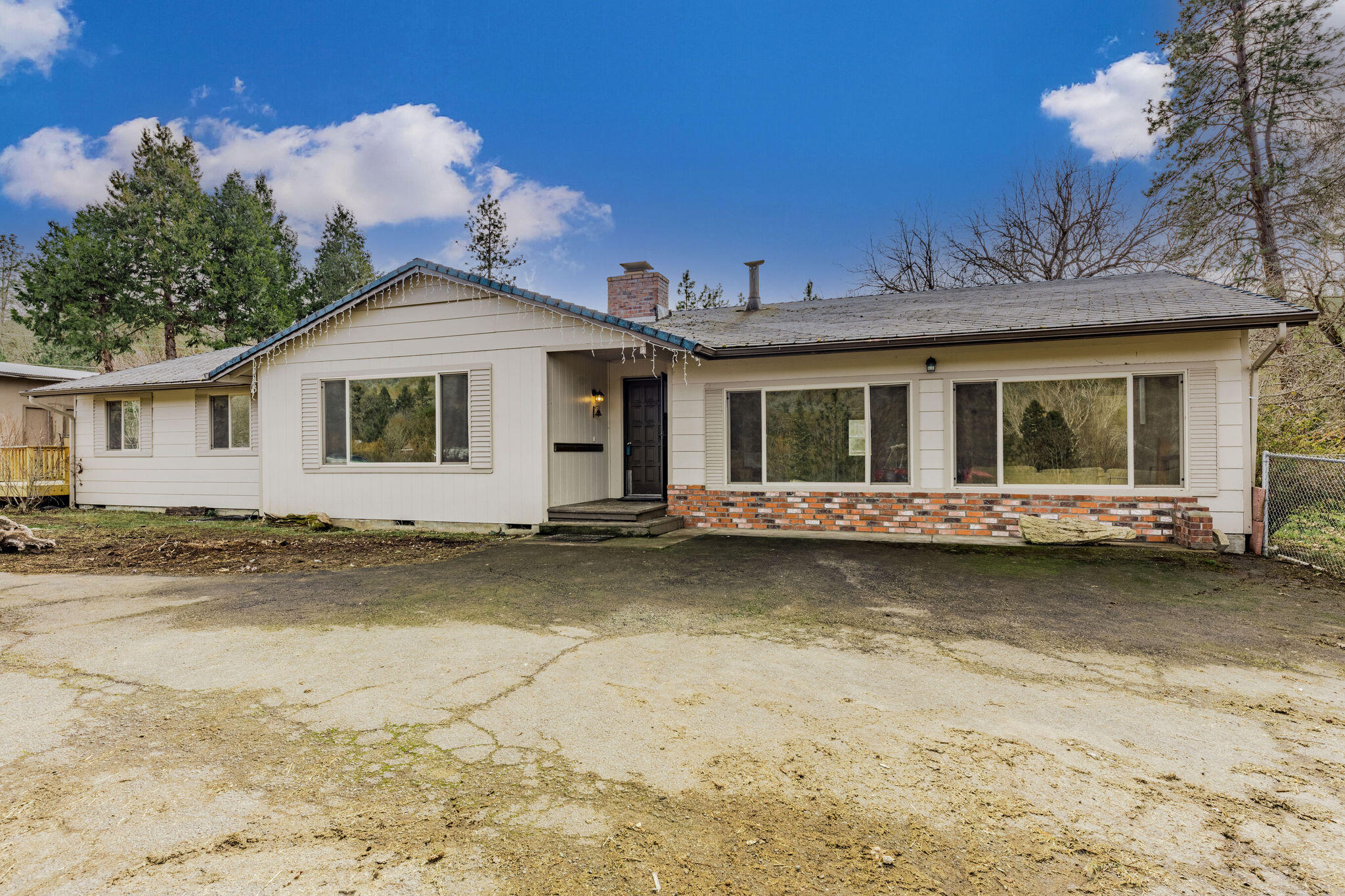 6732 Old Stage Road Central Point, OR 97502 - Photo 6 of 51 a view of a house with a swimming pool and sitting area