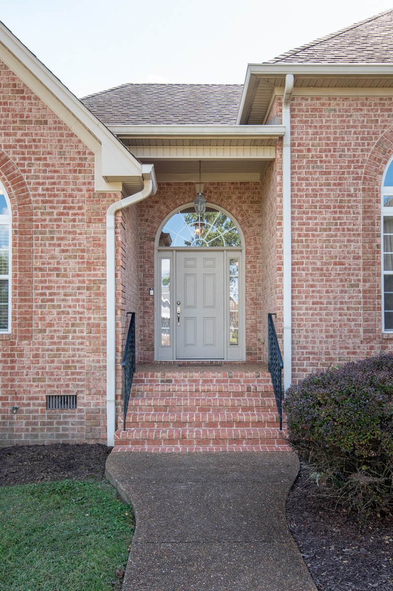 105 Robin Point Gallatin, TN 37066 - Photo 12 of 59 a front view of a house with a yard