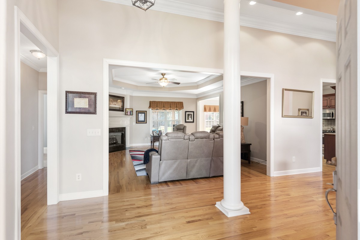 105 Robin Point Gallatin, TN 37066 - Photo 14 of 59 a living room with furniture and a wooden floor