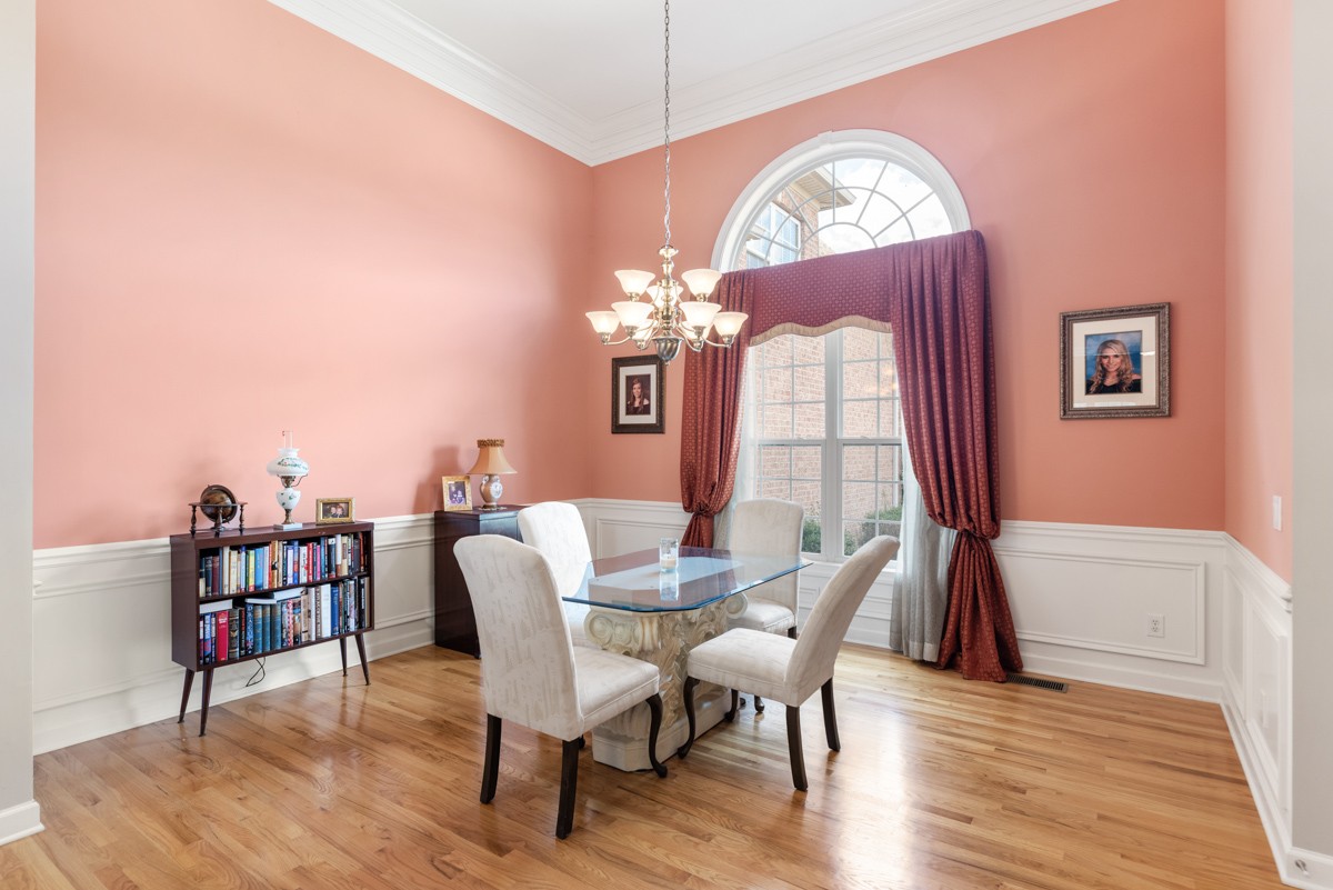 105 Robin Point Gallatin, TN 37066 - Photo 19 of 59 a dining room with furniture a chandelier and wooden floor