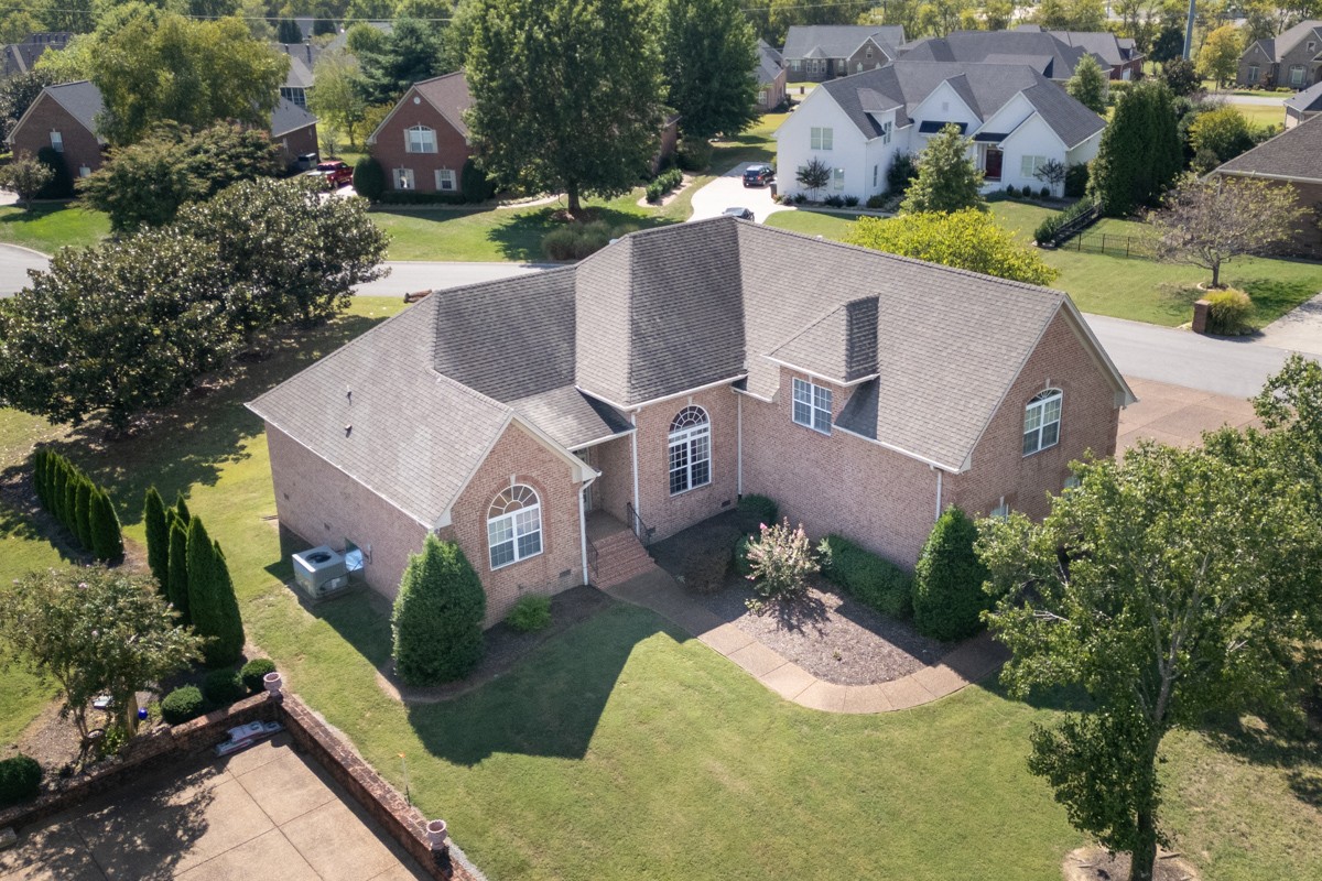 105 Robin Point Gallatin, TN 37066 - Photo 3 of 59 an aerial view of a house with a garden and a yard
