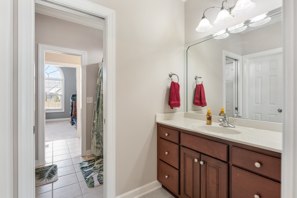 105 Robin Point Gallatin, TN 37066 - Photo 39 of 59 a bathroom with a sink vanity and mirror