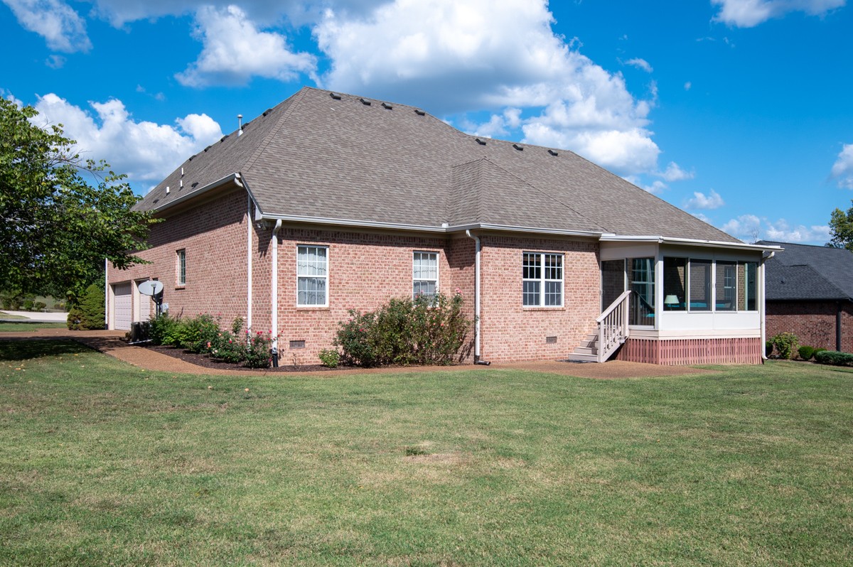 105 Robin Point Gallatin, TN 37066 - Photo 48 of 59 a front view of a house with a yard and garage