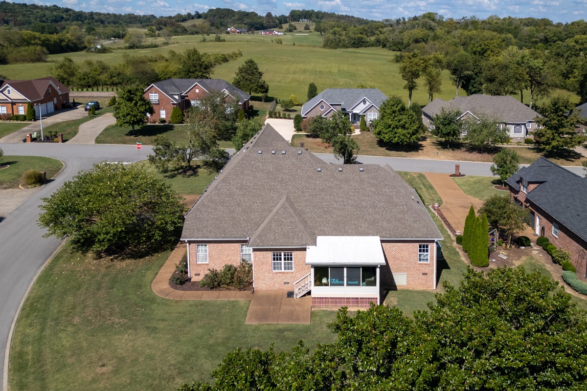 105 Robin Point Gallatin, TN 37066 - Photo 56 of 59 an aerial view of a house with garden space and mountain view in back