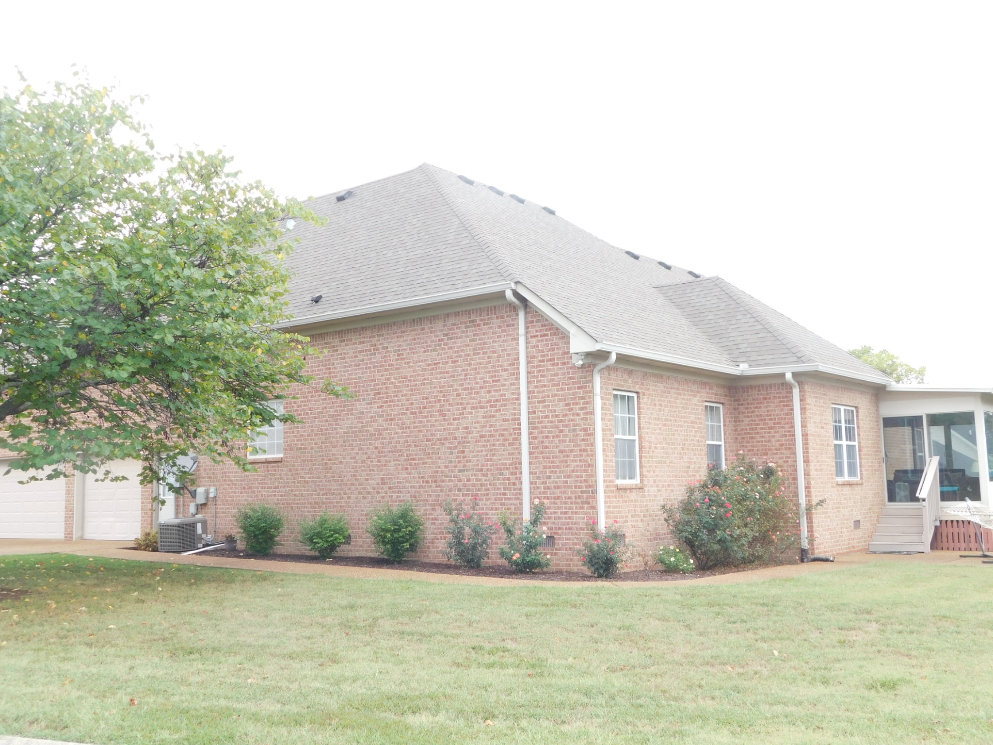 105 Robin Point Gallatin, TN 37066 - Photo 8 of 59 a front view of house with yard and trees