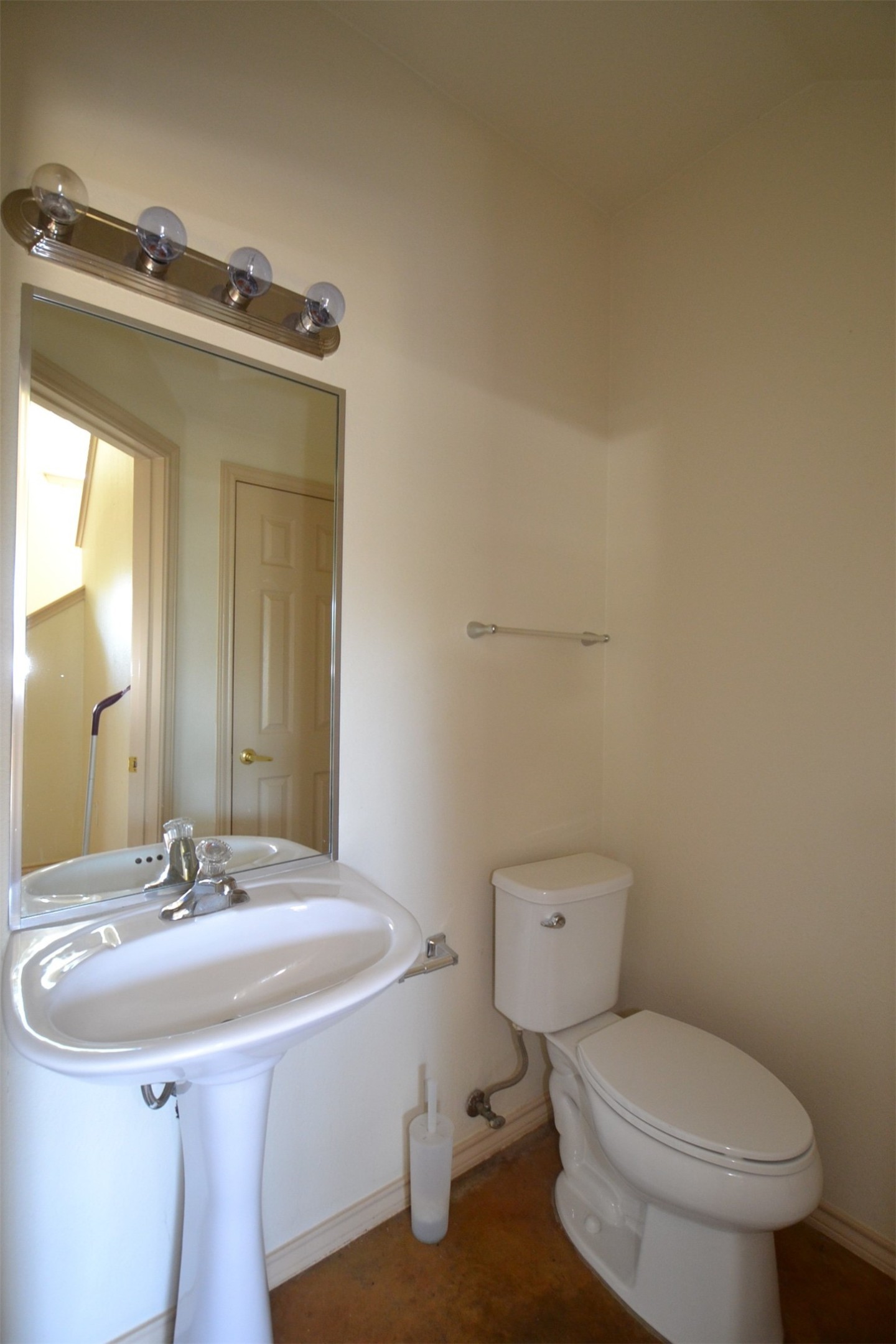 6912 Meador Avenue, Unit A Austin, TX 78752 - Photo 7 of 22 Half bathroom featuring toilet and a sink