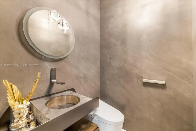 a bathroom with a bathtub and a sink