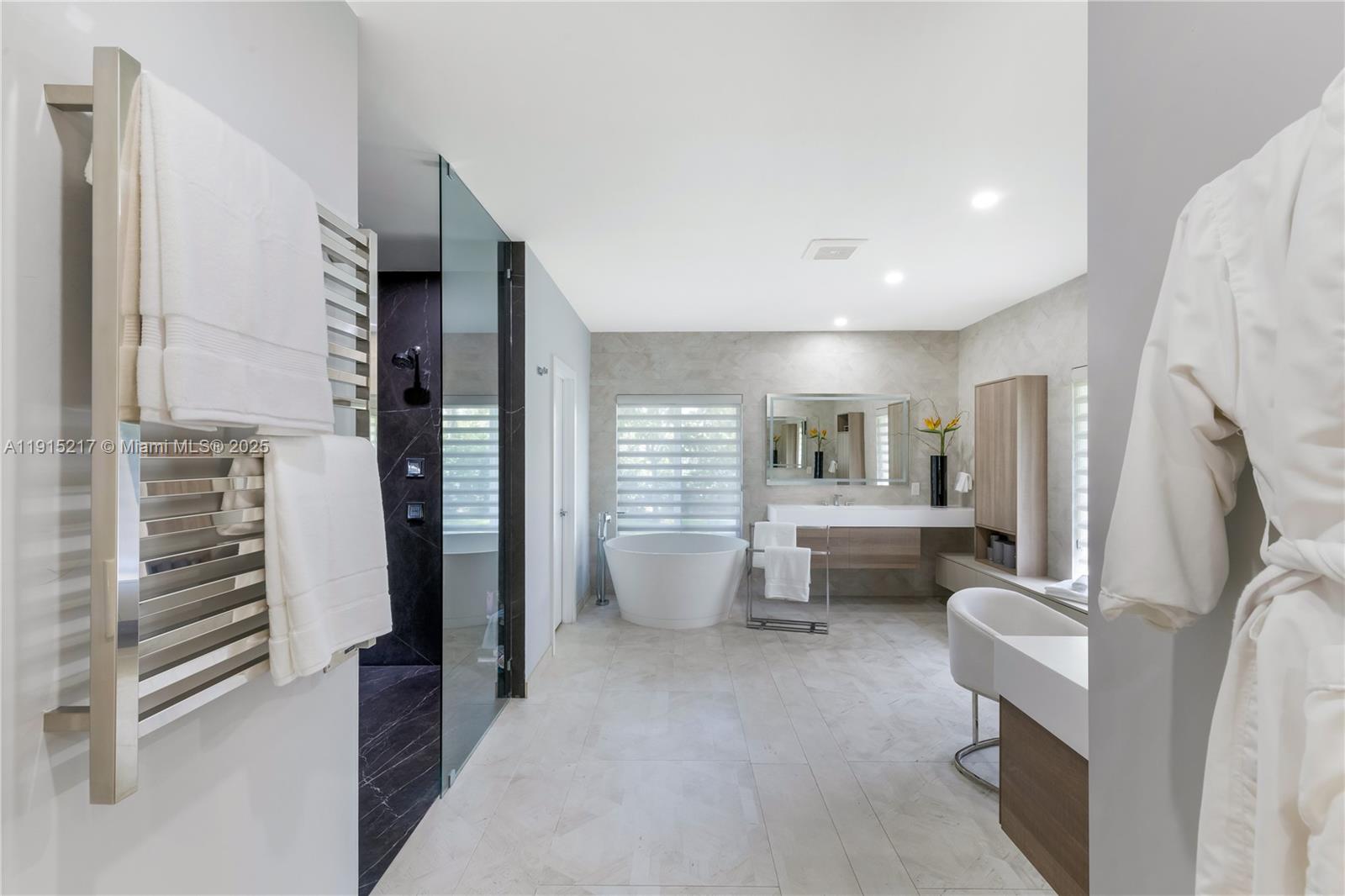 8941 Southwest 65th Court, Unit 8941 Pinecrest, FL 33156 - Photo 26 of 85 a living room with furniture and a wooden floor