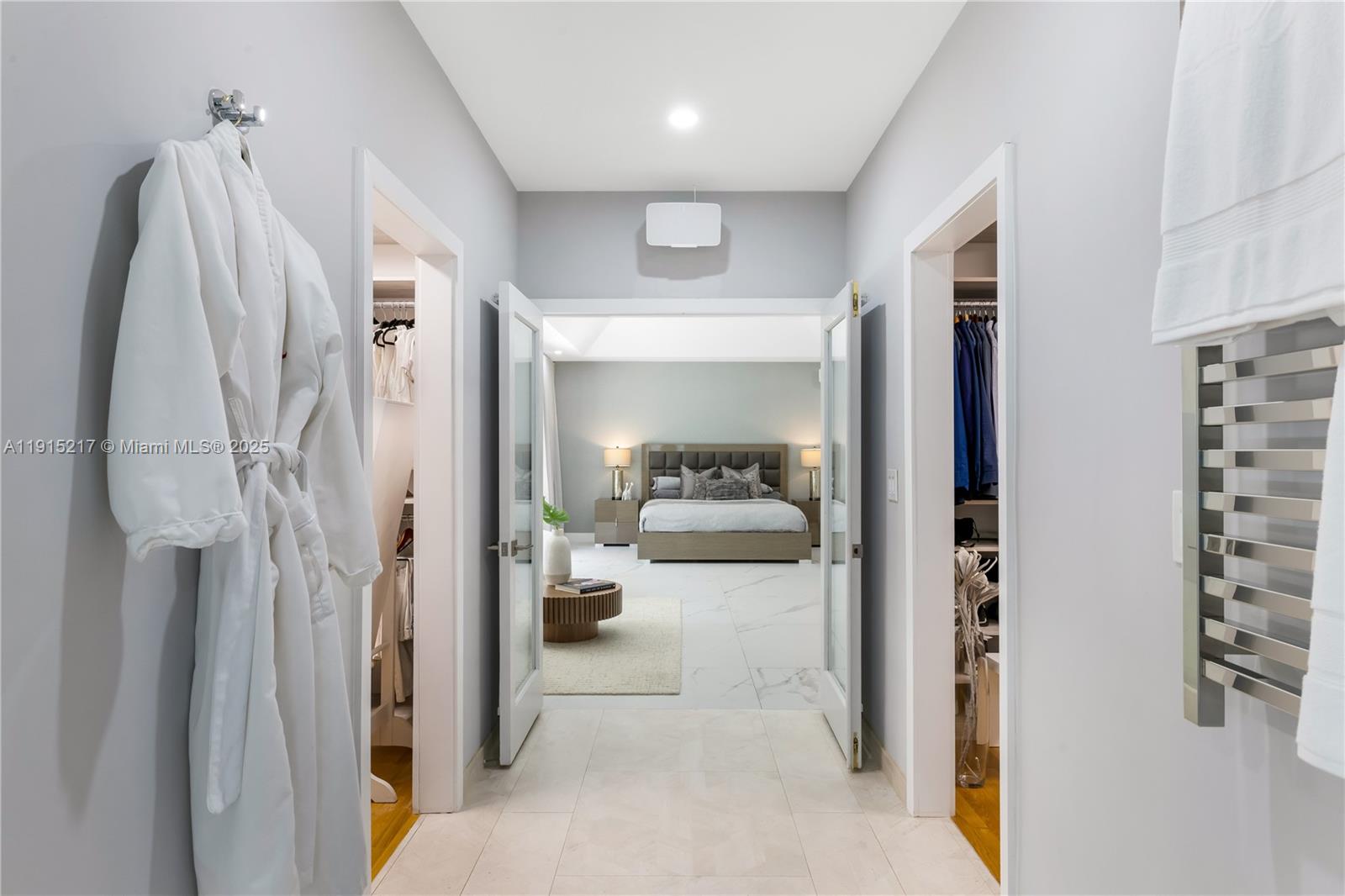 8941 Southwest 65th Court, Unit 8941 Pinecrest, FL 33156 - Photo 29 of 85 a en suite bathroom with a sink and a mirror