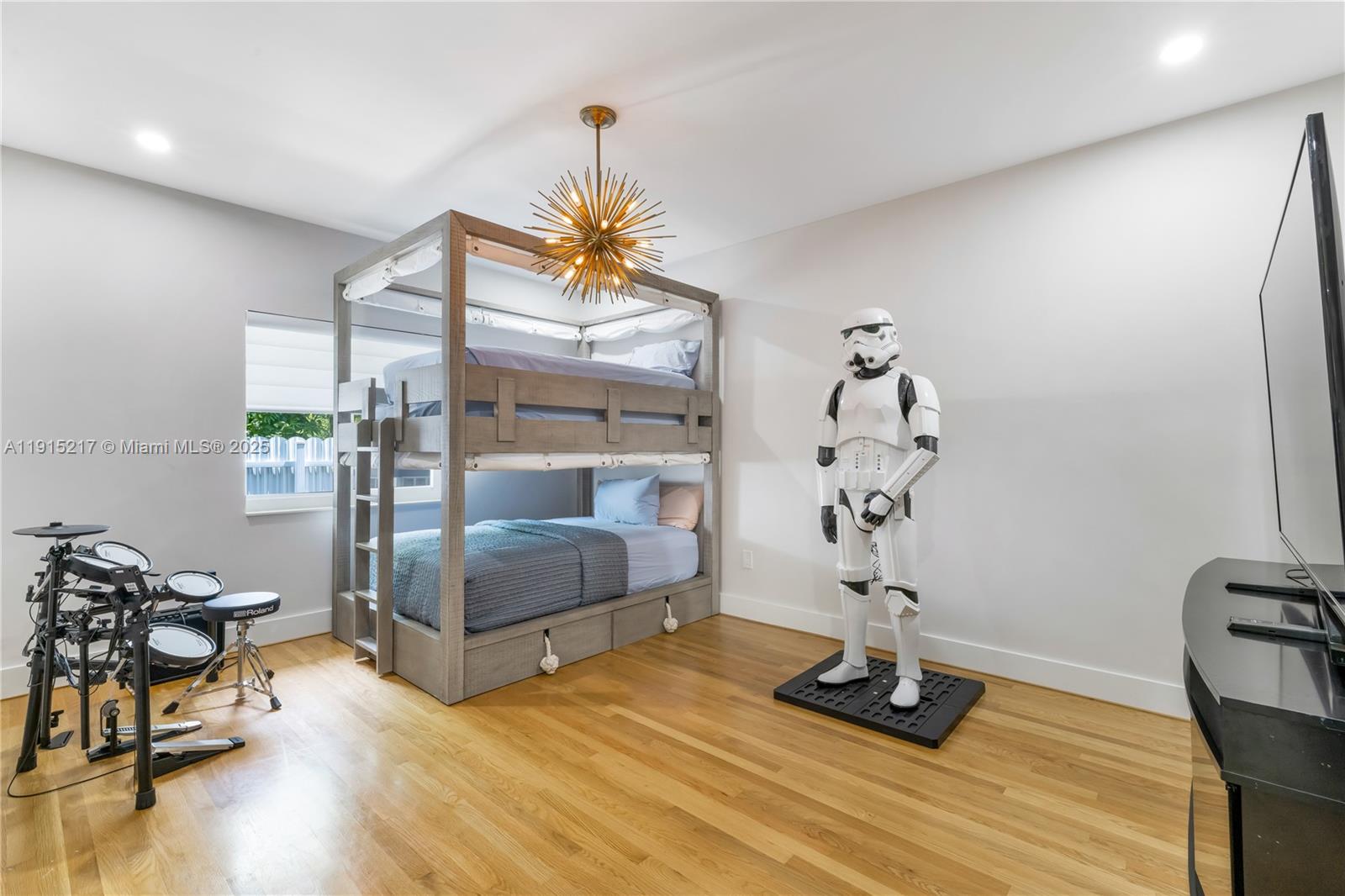 8941 Southwest 65th Court, Unit 8941 Pinecrest, FL 33156 - Photo 34 of 85 a living room with furniture and wooden floor