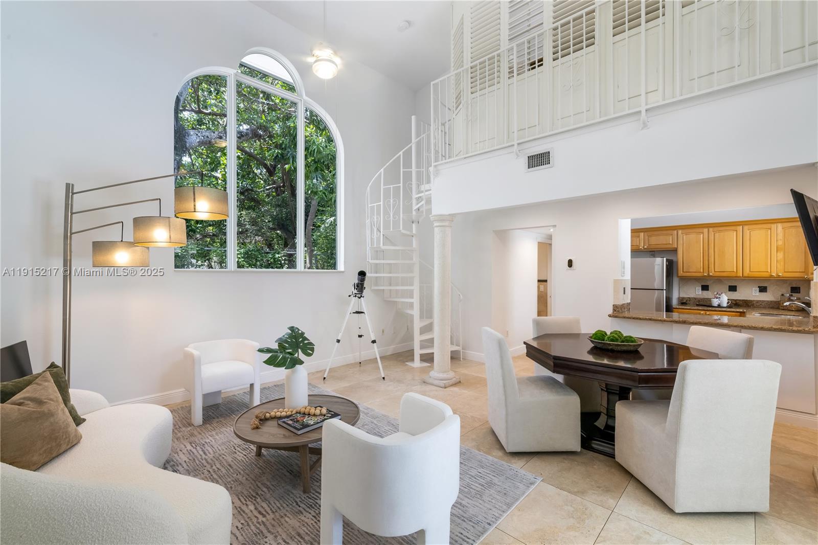 8941 Southwest 65th Court, Unit 8941 Pinecrest, FL 33156 - Photo 42 of 85 a living room with furniture and a large window