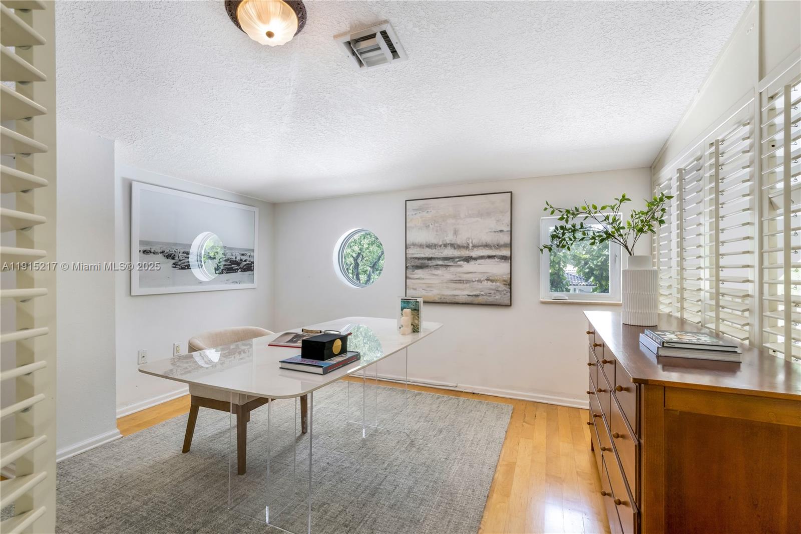 8941 Southwest 65th Court, Unit 8941 Pinecrest, FL 33156 - Photo 48 of 85 a workspace with furniture and window