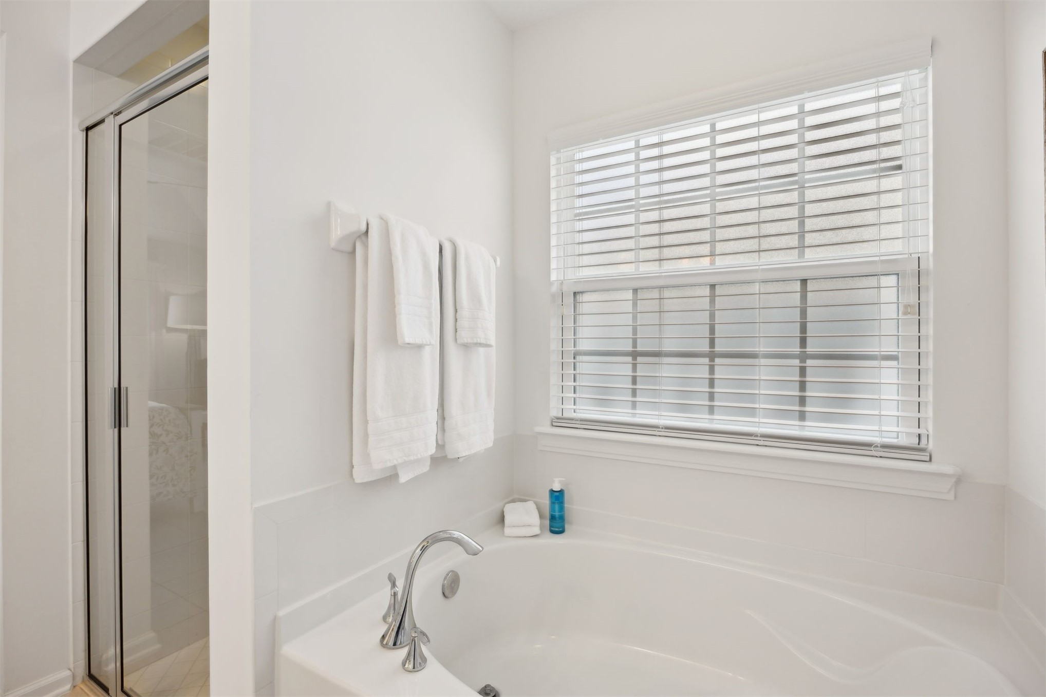94037 Last Lane Yulee, FL 32097 - Photo 22 of 38 a white bath tub sitting next to a window