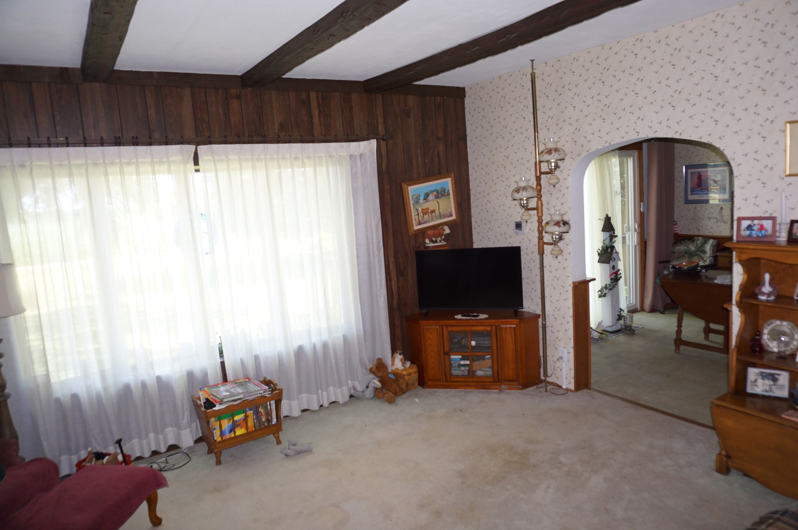 1924 East 6000th Road South St. Anne, IL 60964 - Photo 13 of 35 a living room with furniture and a flat screen tv
