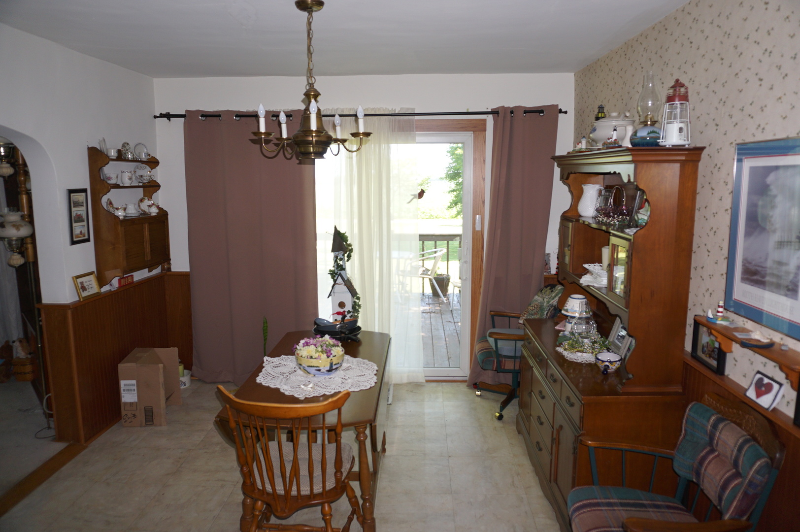 1924 East 6000th Road South St. Anne, IL 60964 - Photo 9 of 35 a view of a dining room with furniture window and wooden floor