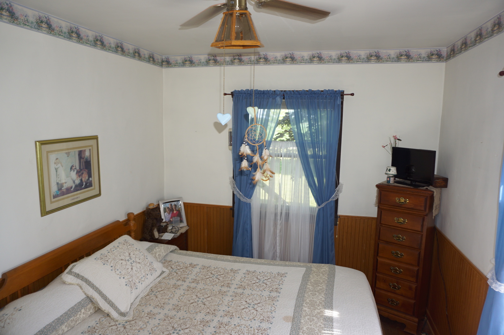 1924 East 6000th Road South St. Anne, IL 60964 - Photo 10 of 35 a bedroom with a bed and a television