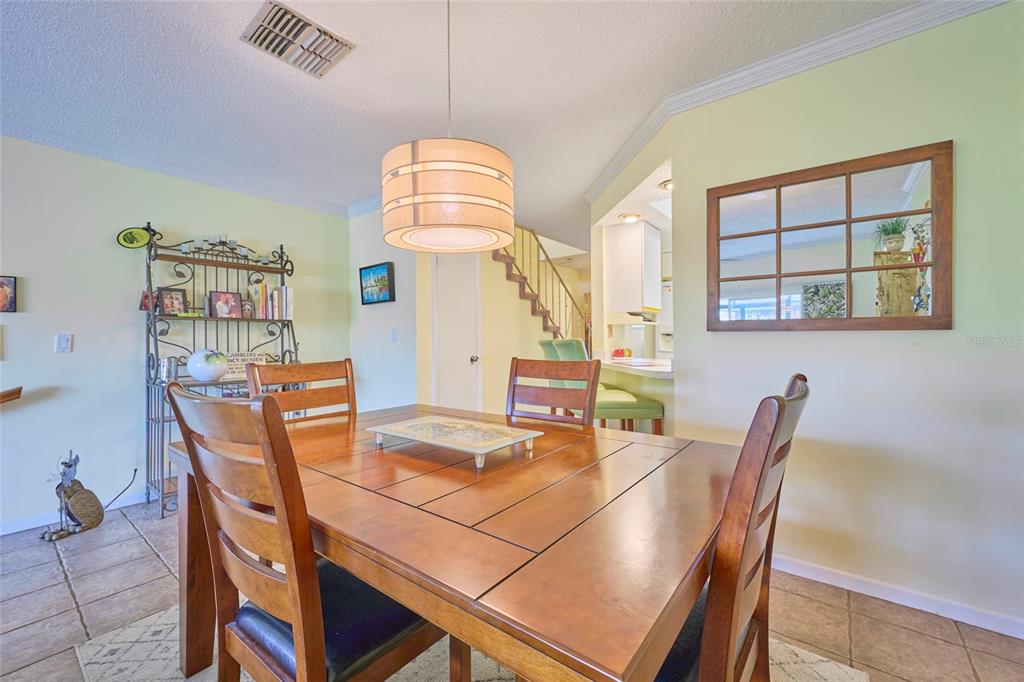 3647 Edgewater Drive Sebring, FL 33872 - Photo 11 of 54 a view of a dining room with furniture