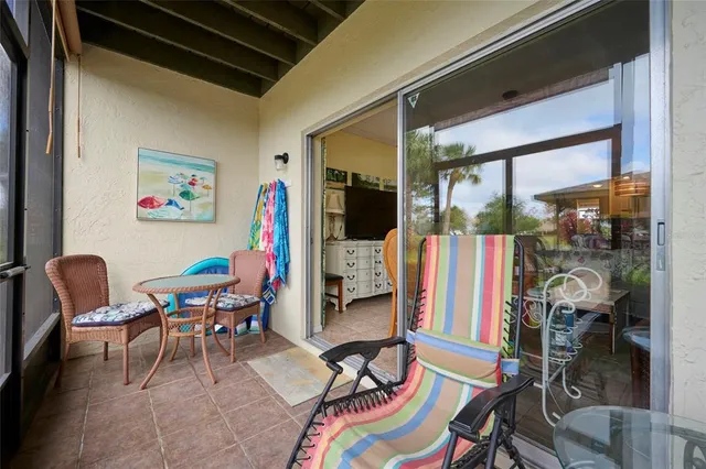 a workspace with furniture and a flat screen tv