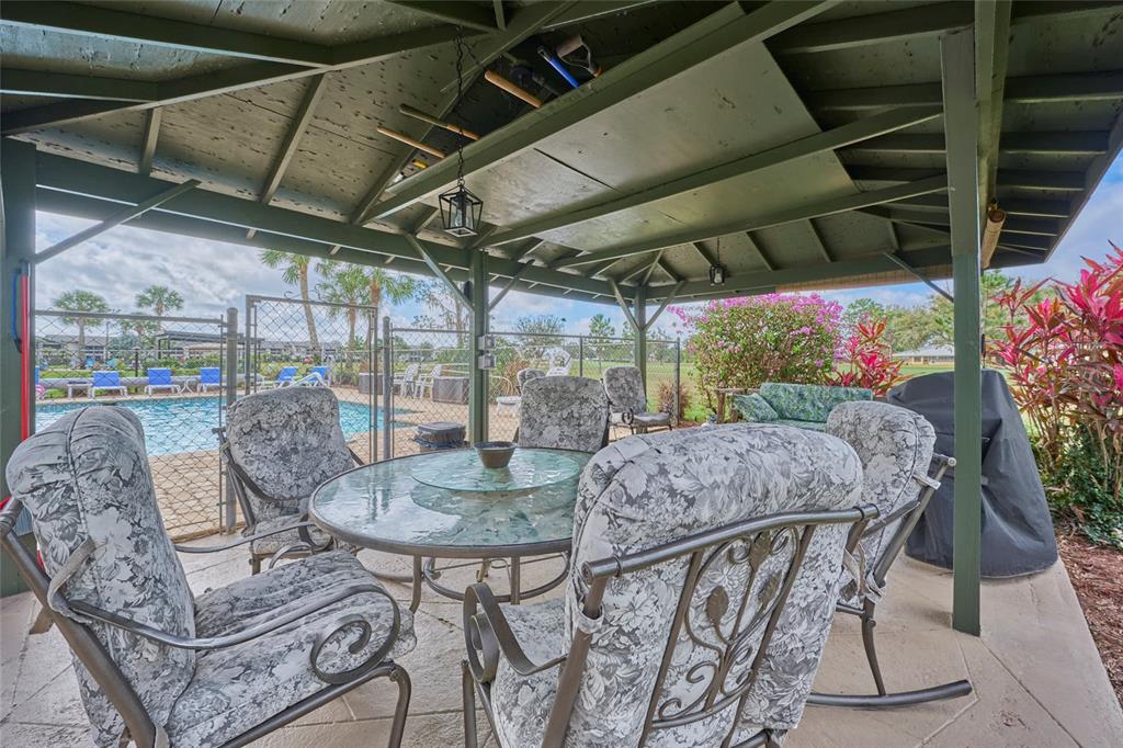 3647 Edgewater Drive Sebring, FL 33872 - Photo 38 of 54 a view of porch with seating area