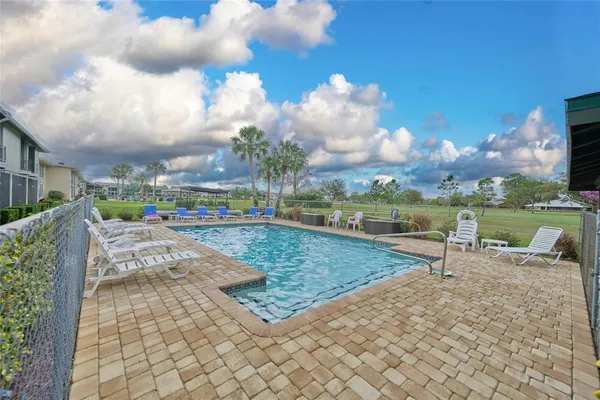 a view of a house with a swimming pool