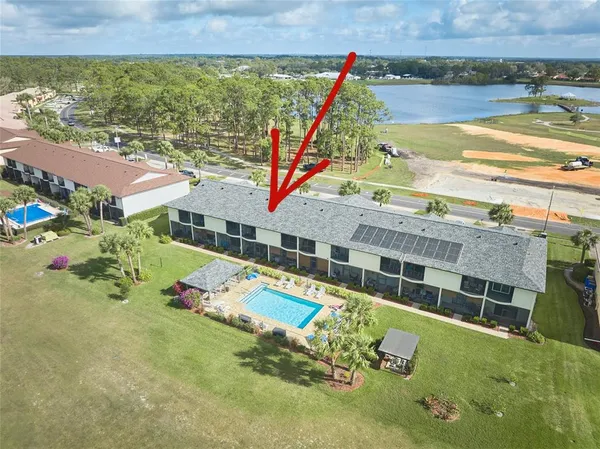 a view of a patio with furniture
