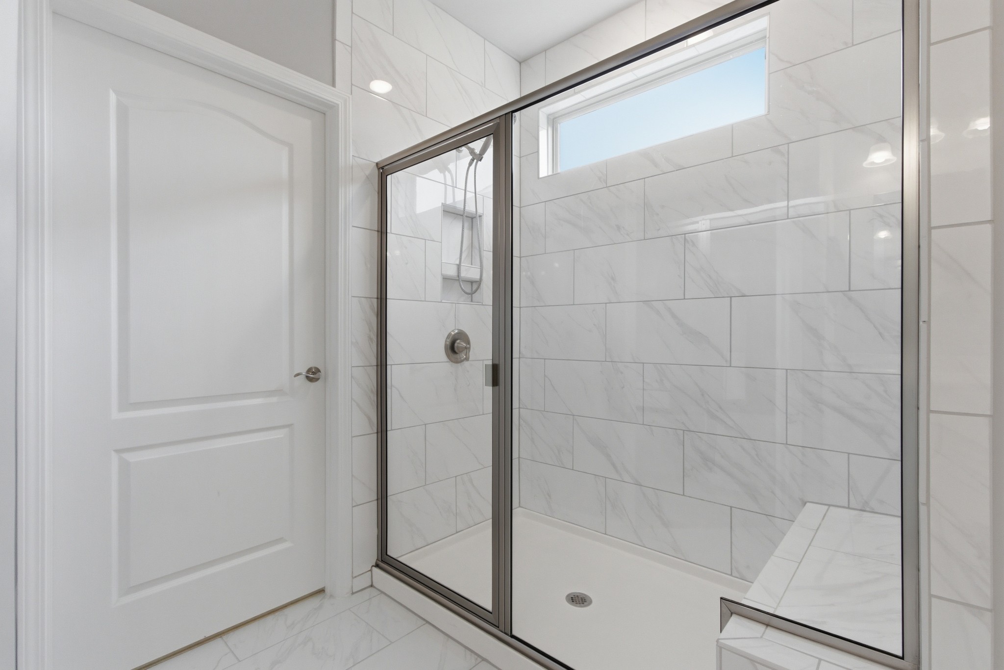 2321 Lawrence Ridge Spring Hill, TN 37174 - Photo 28 of 59 a bathroom with a glass shower door