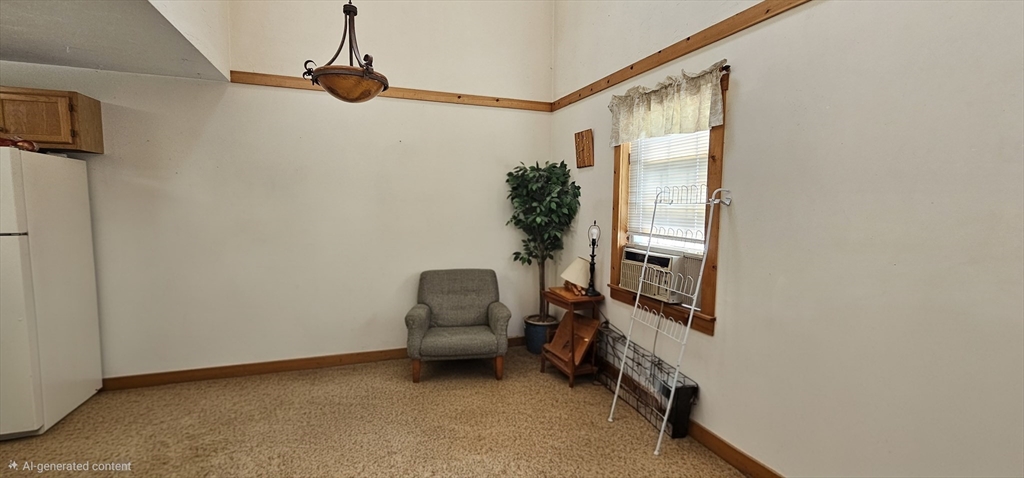 191 City Depot Road, Unit A Charlton, MA 01507 - Photo 7 of 12 a living room with furniture and a window