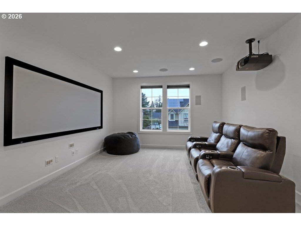 3356 Northwest 153rd Terrace Portland, OR 97229 - Photo 16 of 24 a living room with furniture and a flat screen tv