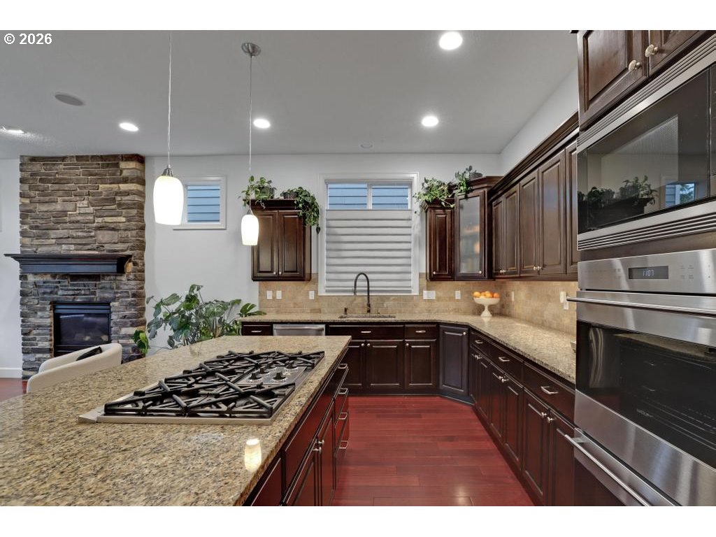 3356 Northwest 153rd Terrace Portland, OR 97229 - Photo 10 of 24 a kitchen with a stove and a sink