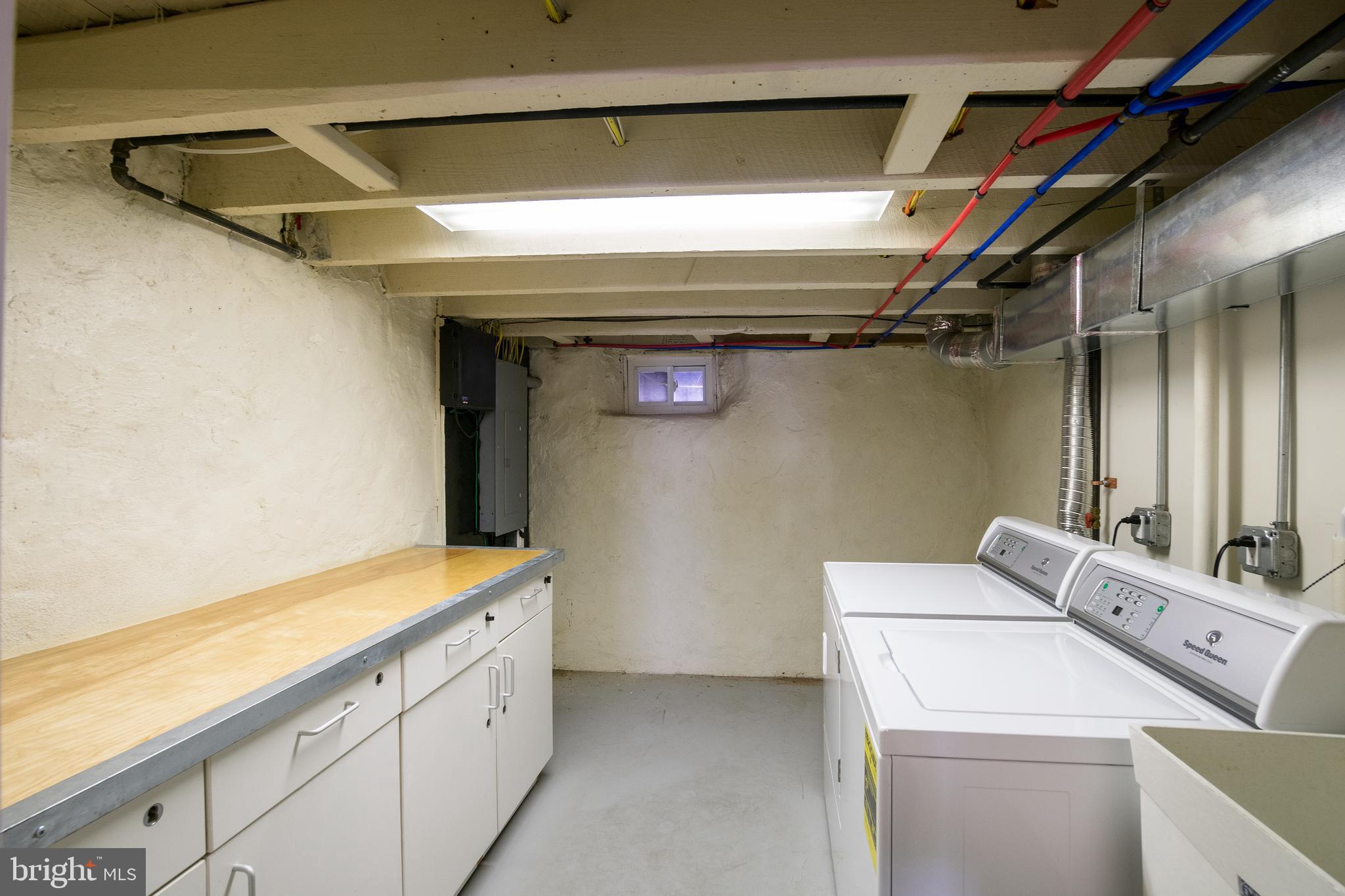3462 Almond Street Philadelphia, PA 19134 - Photo 16 of 32 a utility room with dryer and washer