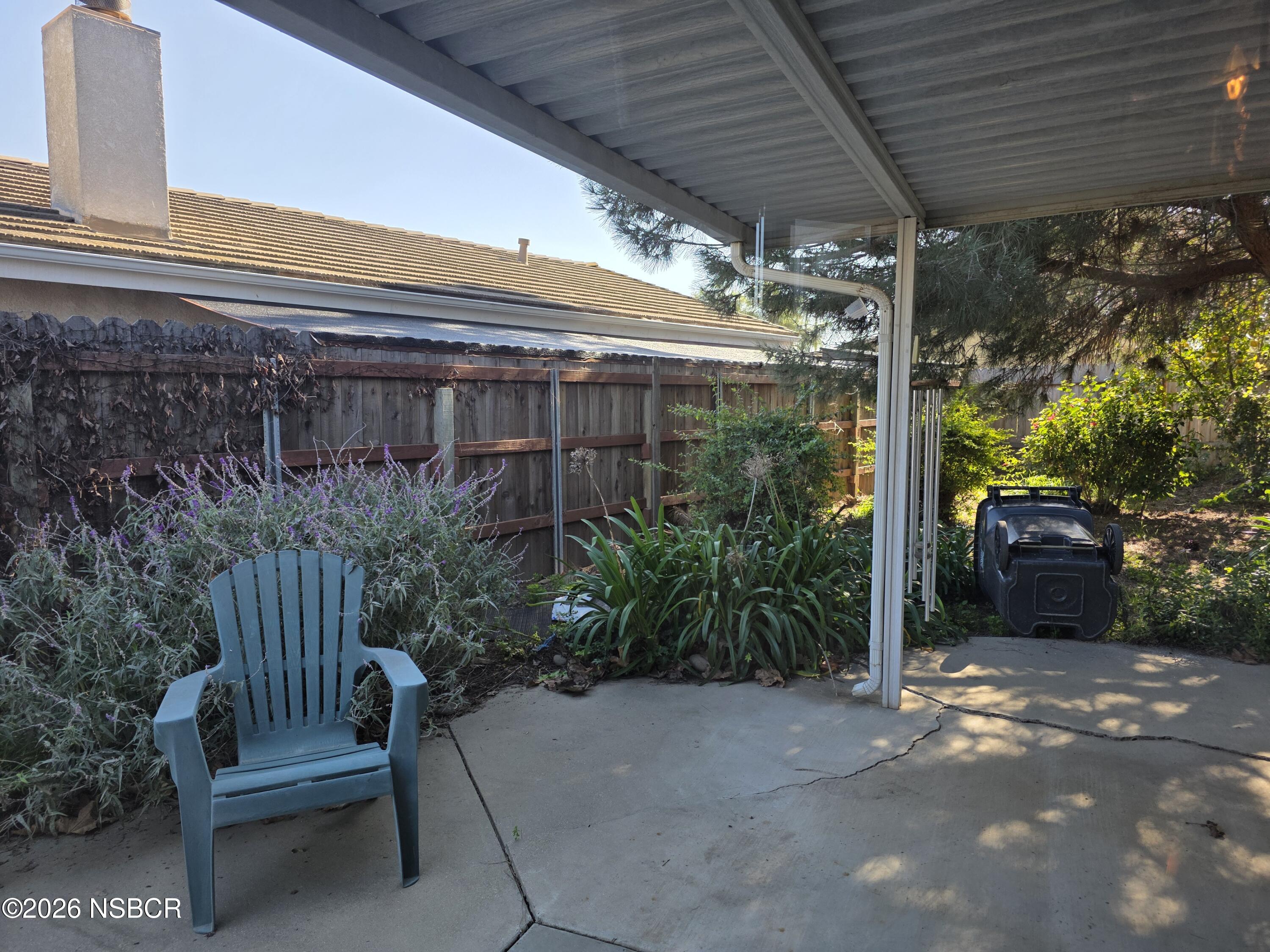 1112 Rachel Drive Santa Maria, CA 93454 - Photo 18 of 23 a view of backyard with outdoor seating and plants